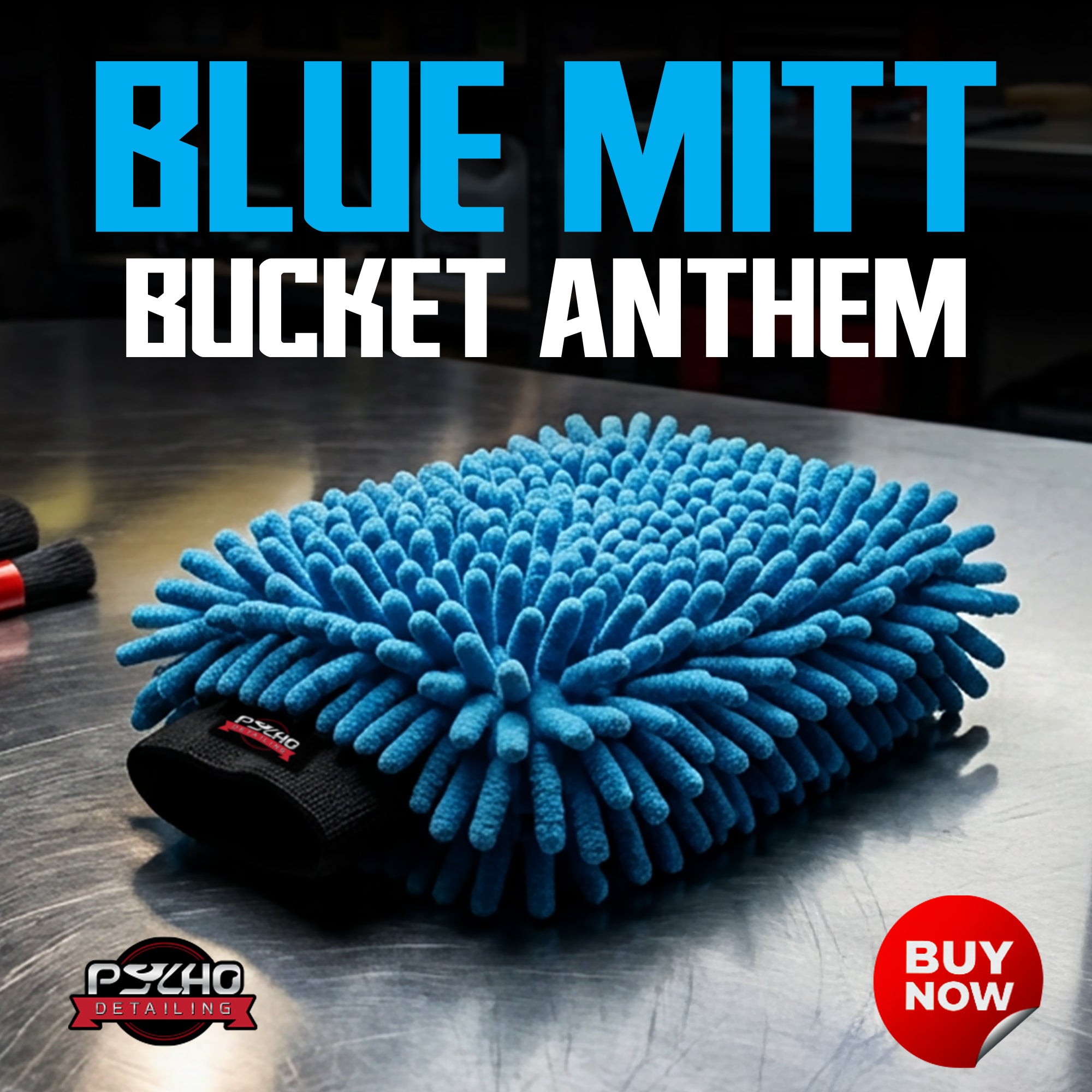 Blue microfiber mitt with 'Blue Mitt Bucket Anthem' text and Psycho Detailing logo on a metallic surface.